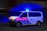 dutch-police-car-full-speed-blue-lights-sirens-night-amsterdam-186584461.jpg